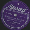 Tony Aguilar - Contigo en la Distancia / El Muneco de Cuerda